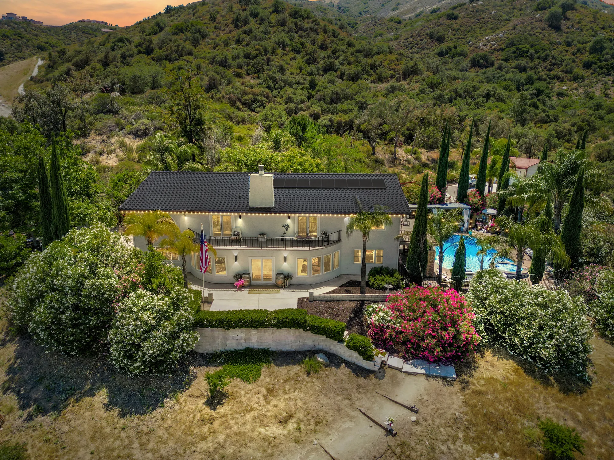 Hilltop estate at sunset
